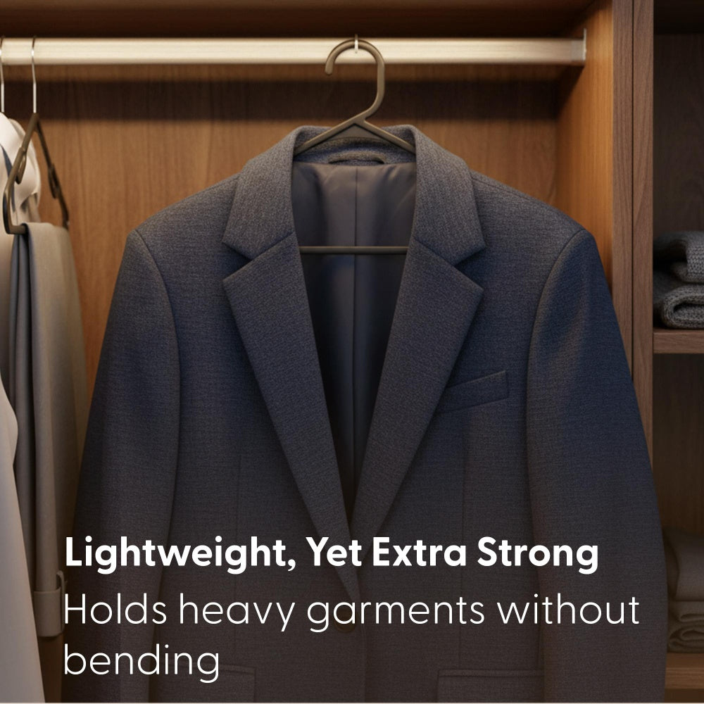 Strong plastic coat hanger holding a heavy suit jacket in a wardrobe without bending