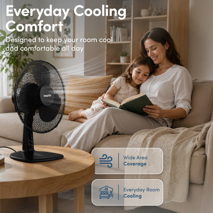 Black 12 inch desk fan on living room table for everyday quiet cooling comfort