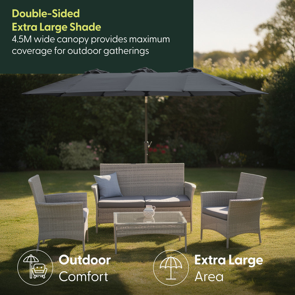 4.5M double garden parasol in grey shading rattan garden furniture set on a lawn