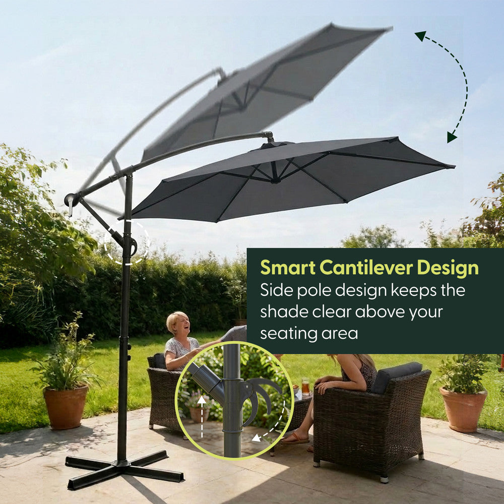 Grey 3m offset cantilever garden parasol rotating over garden chairs on patio – side pole keeps shade clear above seating area