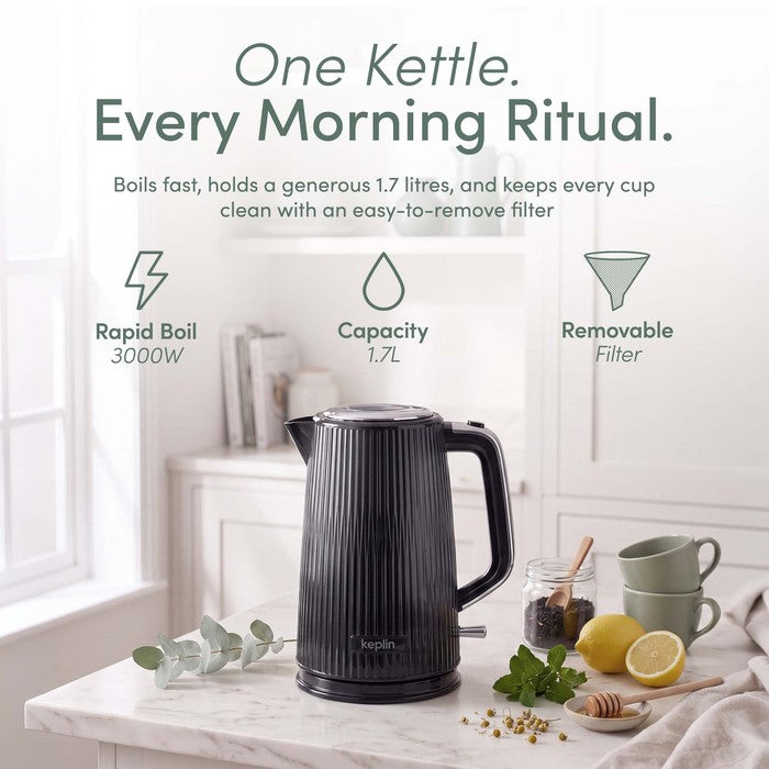 Black ribbed Keplin 1.7L electric kettle on a kitchen worktop beside cups, lemon, honey and mint, with text highlighting 3000W rapid boil, 1.7L capacity and removable filter.