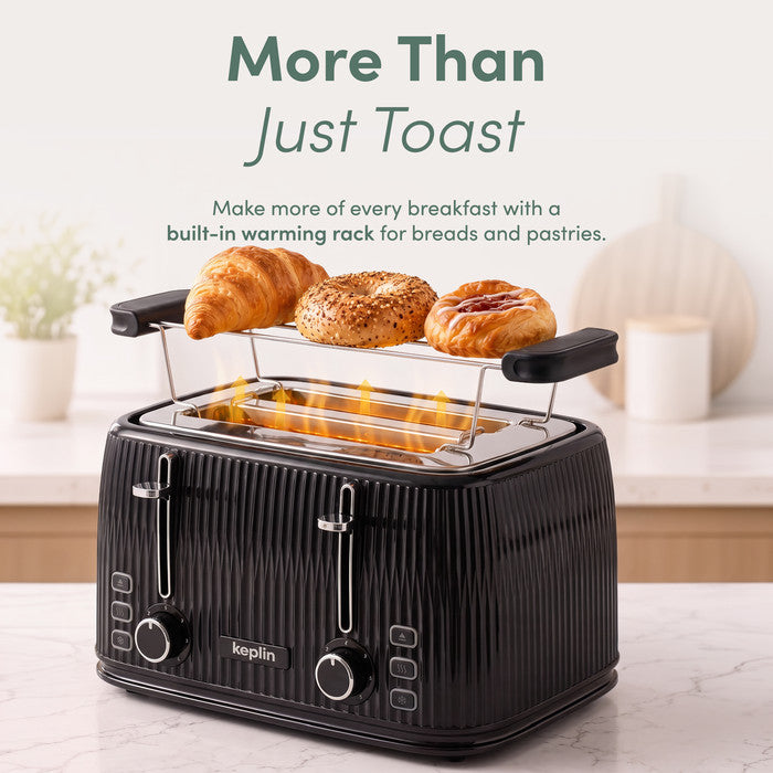 Keplin 2 slice toaster warming rack heating a croissant, bagel and pastry over the slots