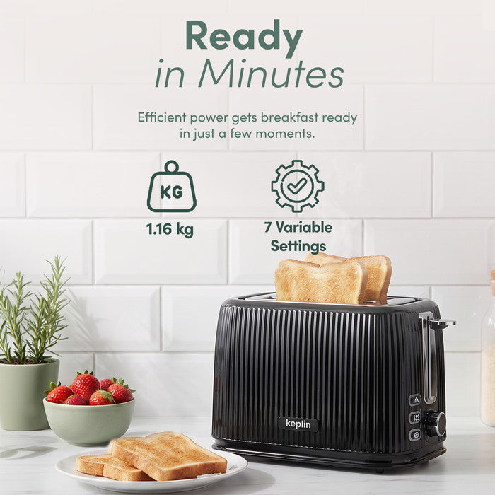 Keplin 2 slice toaster weighing 1.16kg with toast popped up on a kitchen counter