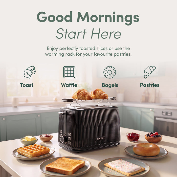 Keplin 2 slice toaster warming rack holding croissants above waffles, bagels and pastries