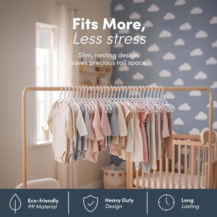 Slim nesting nursery hangers holding a full rail of baby clothes to save space