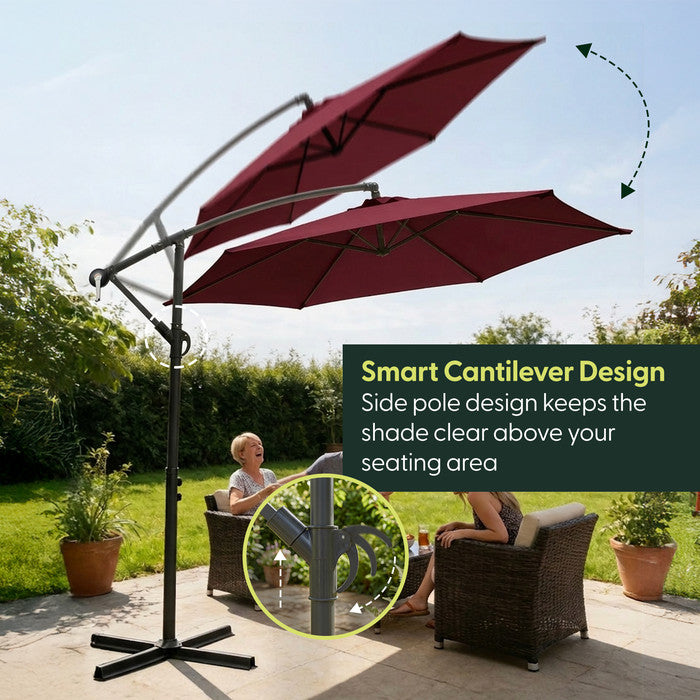 Burgundy 3m cantilever parasol with offset side pole rotating above garden chairs – shade kept clear of outdoor seating area