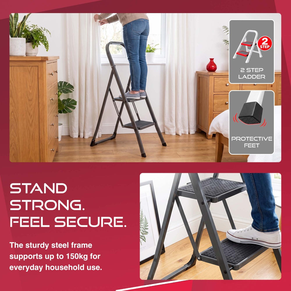 Woman on a Haltons 2 step folding ladder reaching bedroom curtains with a protective rubber foot detail