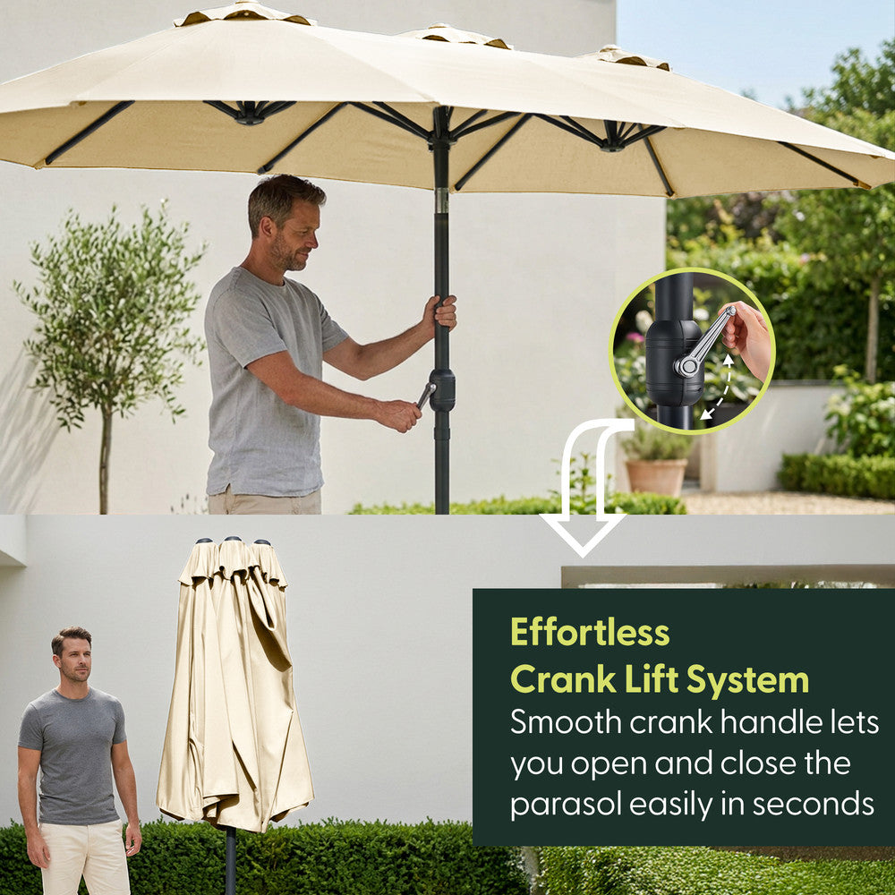 Man using crank handle to open cream double garden parasol – effortless open and close mechanism