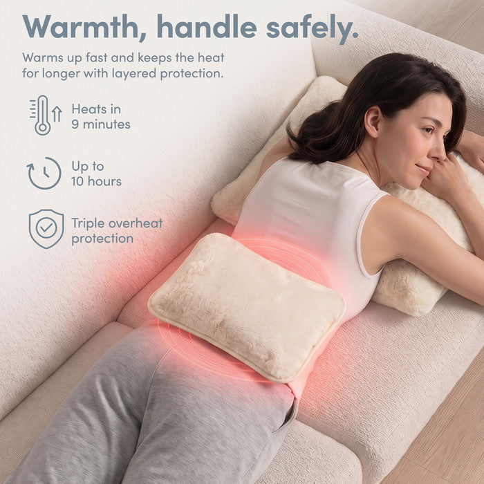 Cream electric heat pad on lower back, heats in 9 minutes and stays warm 10 hours