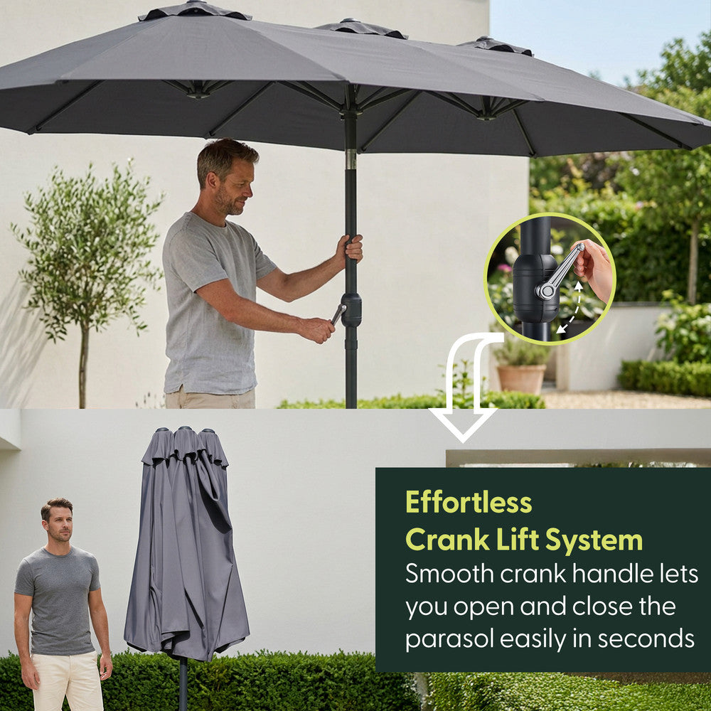 Man using crank handle to open grey double garden parasol – effortless open and close mechanism