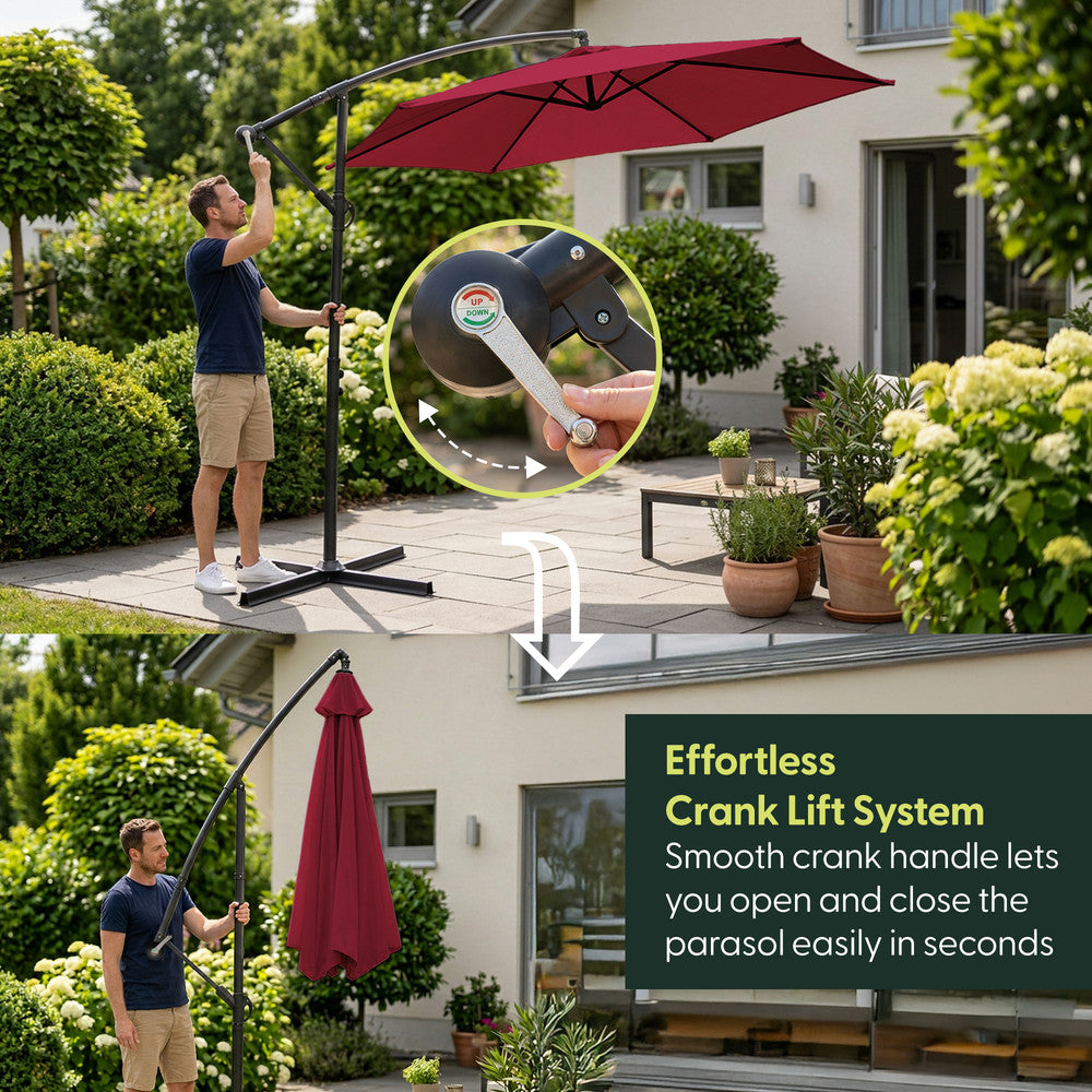 Man opening 3m burgundy cantilever garden parasol using crank handle – effortless open and close mechanism for garden and patio use