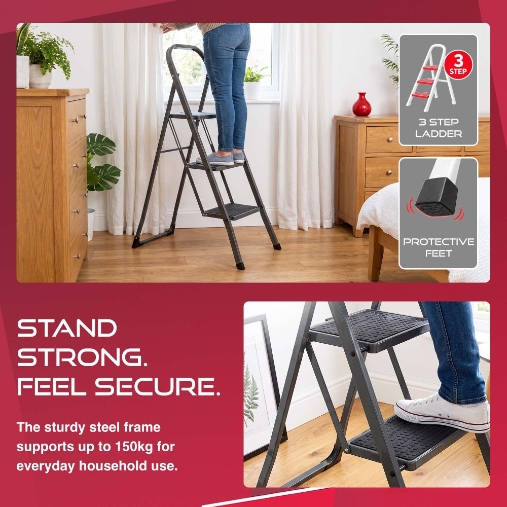 Woman on a Haltons 3 step folding ladder reaching bedroom curtains with a protective rubber foot detail