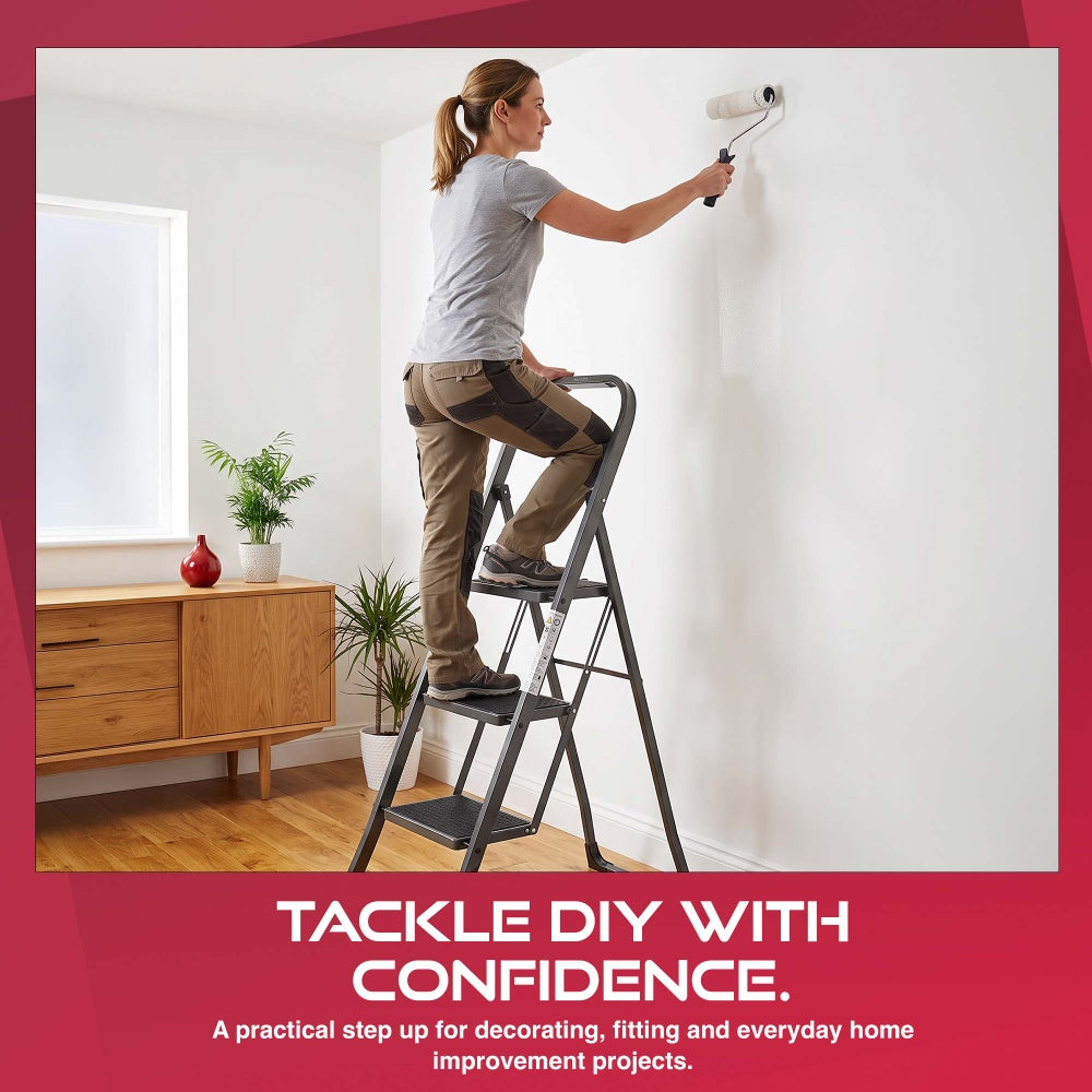 Person painting a wall from a Haltons 3 step folding ladder