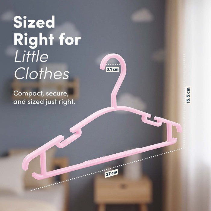 Close-up of a pink non-slip baby hanger measuring 27cm by 15.5cm for babies