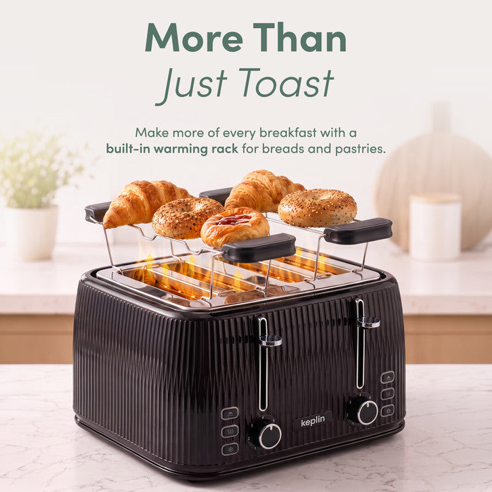 Keplin 4 slice toaster warming rack heating croissants, bagels and a pastry over the slots