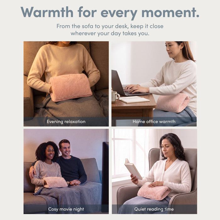 Blush rechargeable hot water bottle used on the sofa, at a desk and while reading