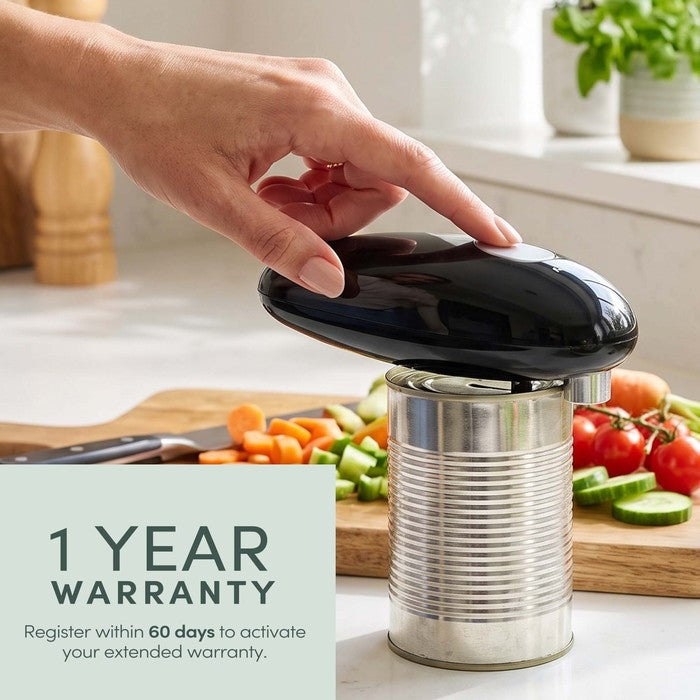 Hand pressing Keplin electric can opener on a tin with 1 year warranty registration callout