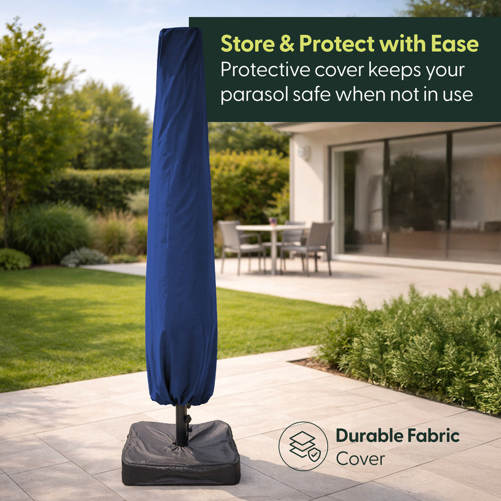 Blue double parasol stored in protective fabric cover on weighted base in a garden