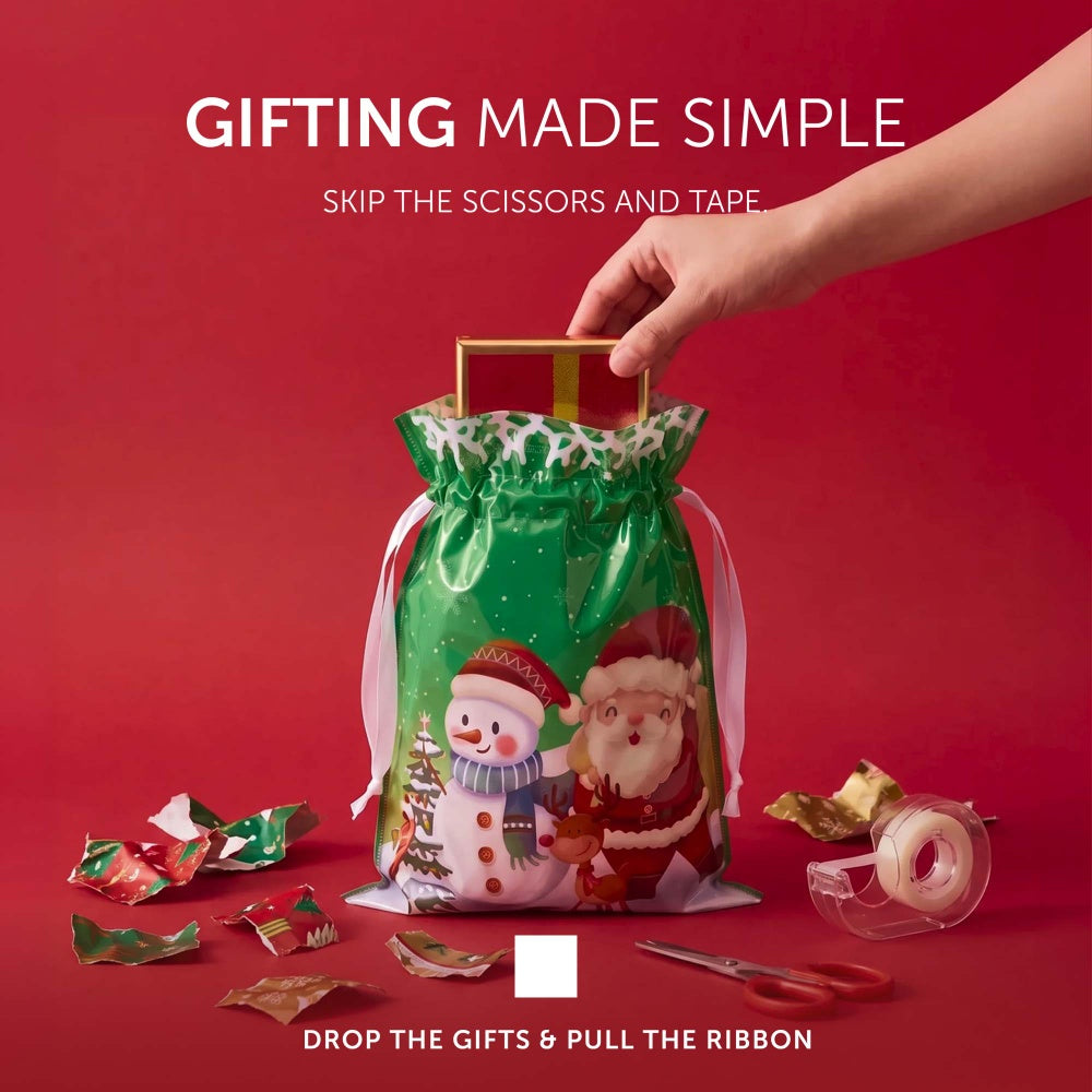 Green Christmas foil gift bag with Santa and snowman design, satin ribbon drawstring, skip the scissors and tape