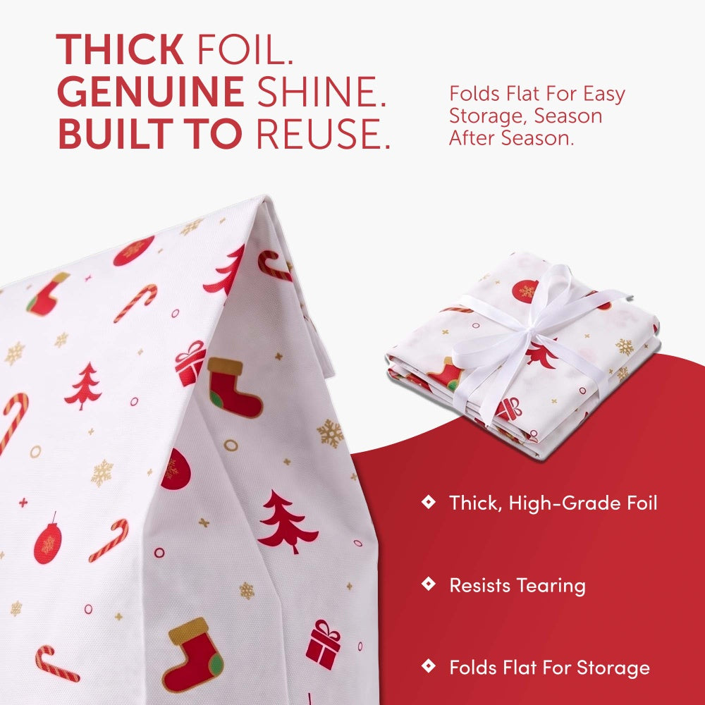 White Christmas foil gift bag with stocking and candy cane print, shown folded flat for storage