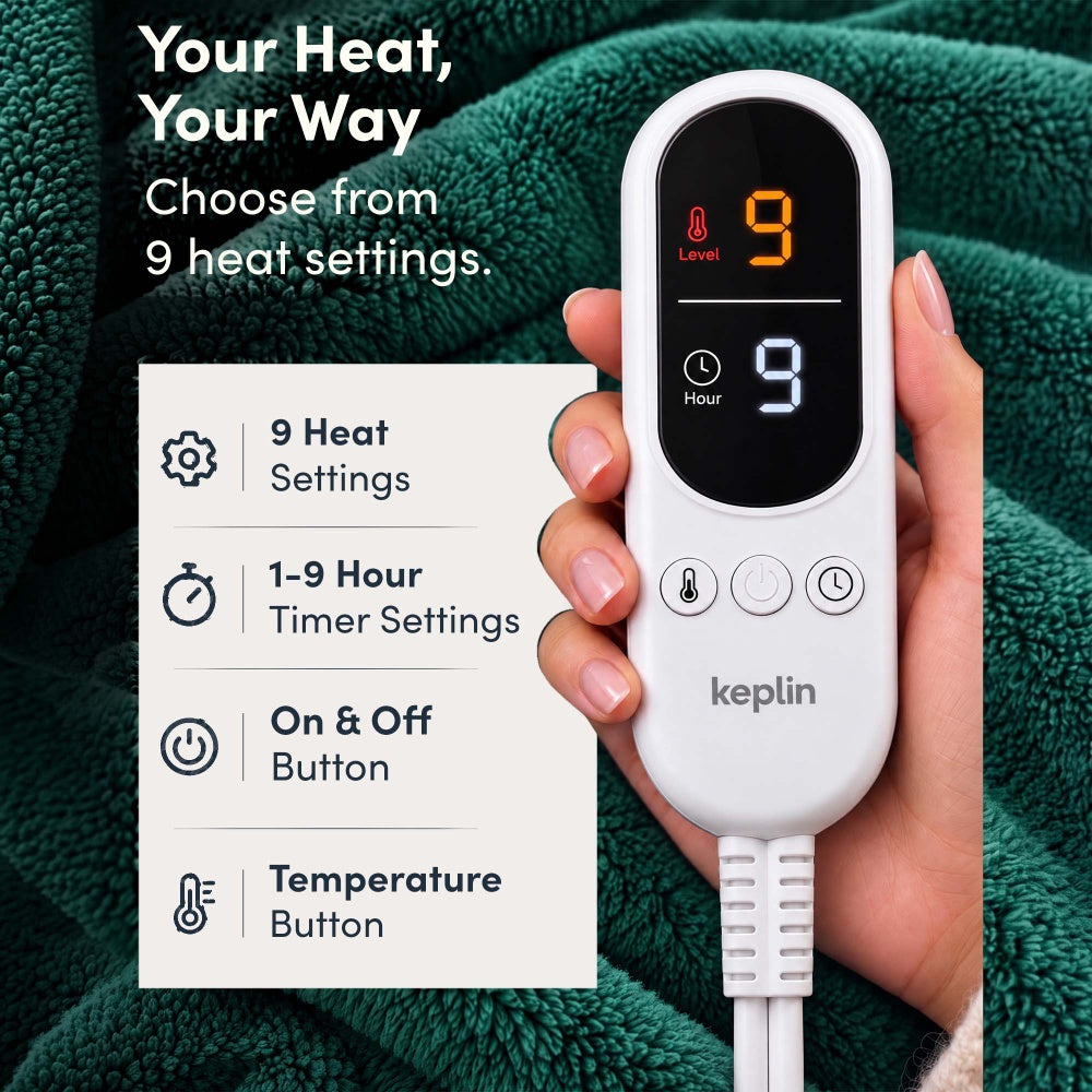 Hand holding remote on emerald green electric throw, 9 heat settings, 1-9 hour timer