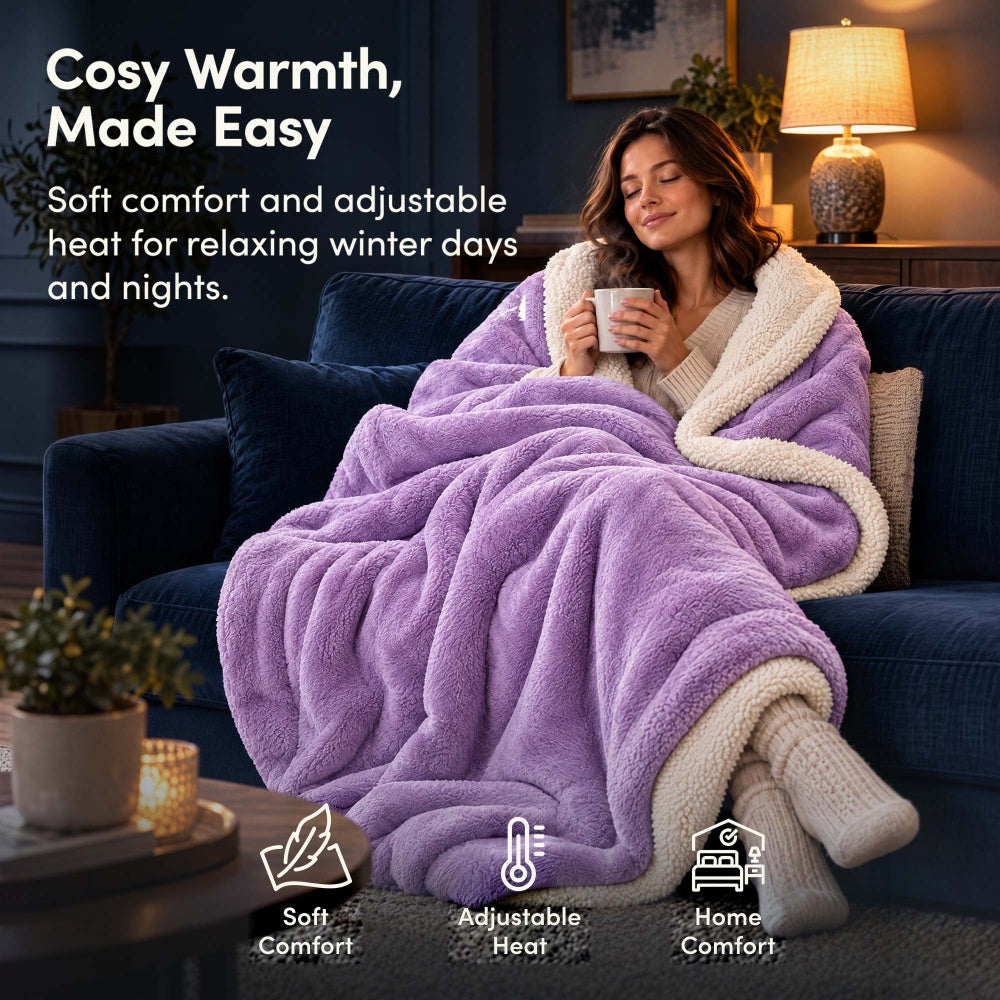 Woman relaxing on sofa under lilac purple electric heated throw blanket with sherpa lining