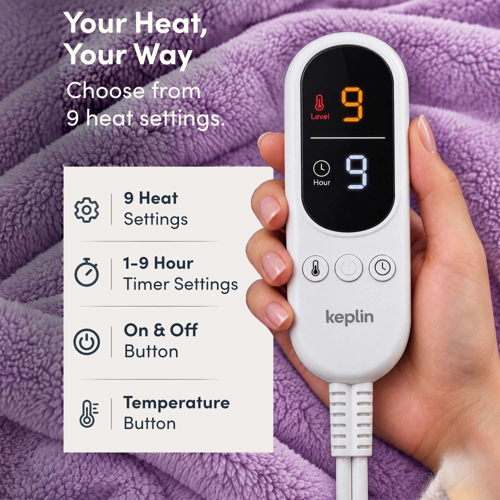 Hand holding remote on lilac purple electric throw, 9 heat settings, 1-9 hour timer