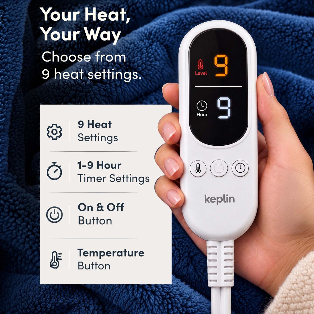 Hand holding remote on navy blue electric throw, 9 heat settings, 1-9 hour timer
