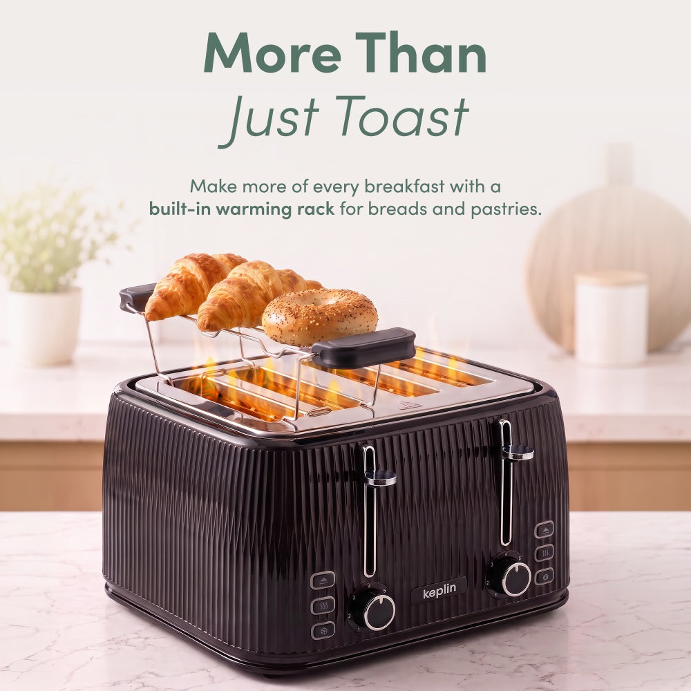 Keplin 4 slice toaster warming rack heating croissants, bagels and a pastry over the slots