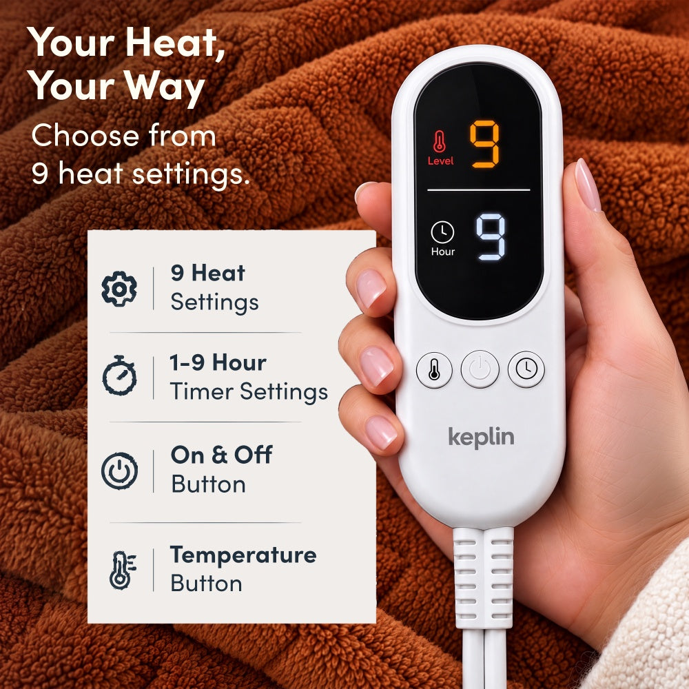 Hand holding remote on terracotta jacquard electric throw, 9 heat settings, 1-9 hour timer