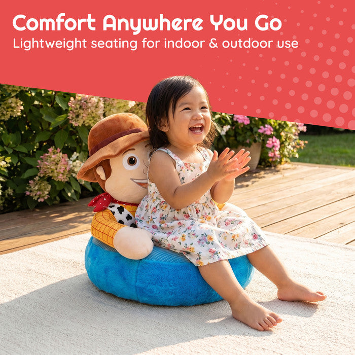 Girl sitting in Disney Toy Story Woody plush kids chair outdoors – lightweight portable children's floor seat
