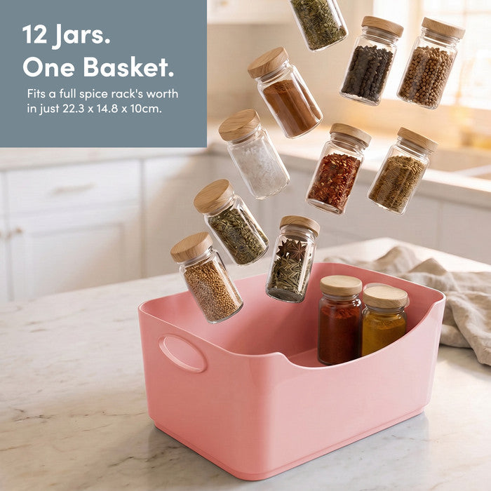 Pink storage basket with handles holding 12 spice jars – pantry organiser