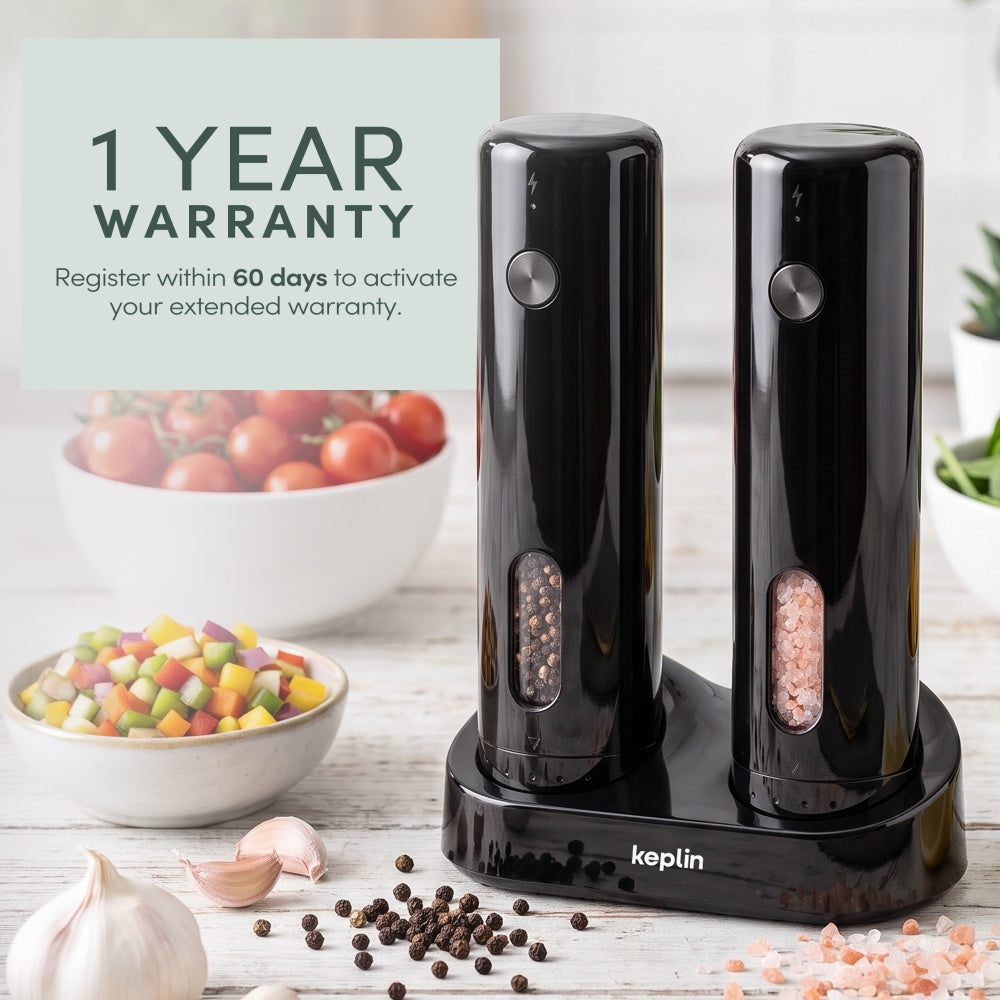 Rechargeable salt and pepper mill set on a worktop with garlic and peppercorns beside a 1 year warranty badge