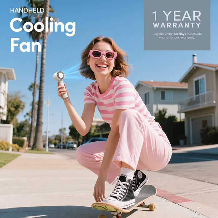 Handheld cooling fan with 1-year warranty – lifestyle image outdoors