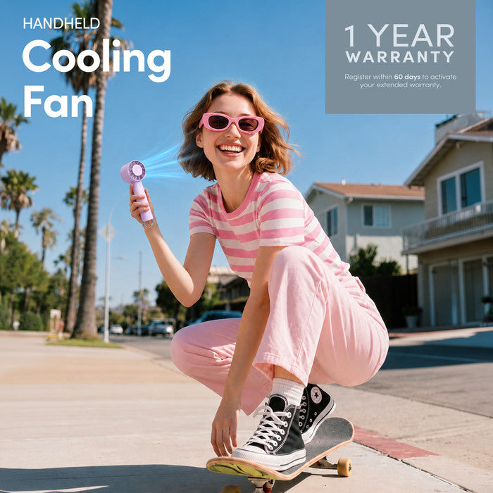 Lavender handheld cooling fan with 1-year warranty – lifestyle image outdoors