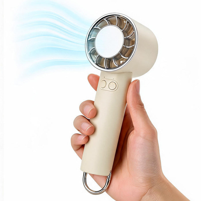 Cream portable handheld fan with cooling plate held in hand