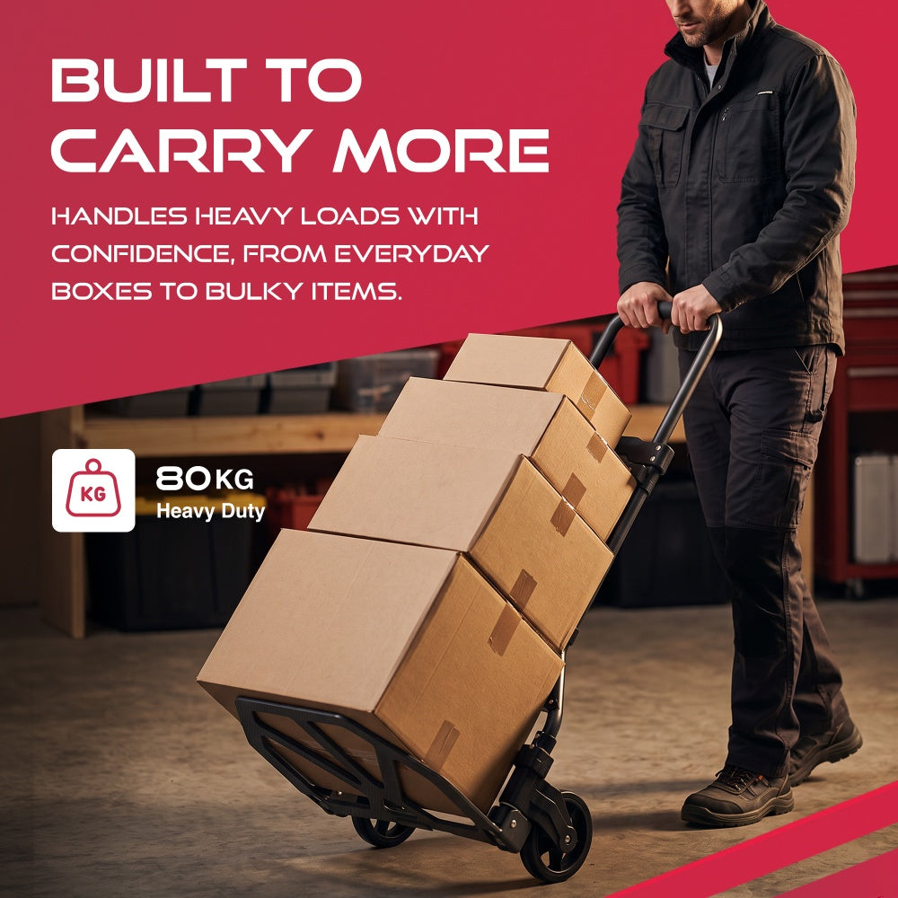 Man moving four stacked boxes on a Haltons folding hand truck with an 80kg heavy duty badge