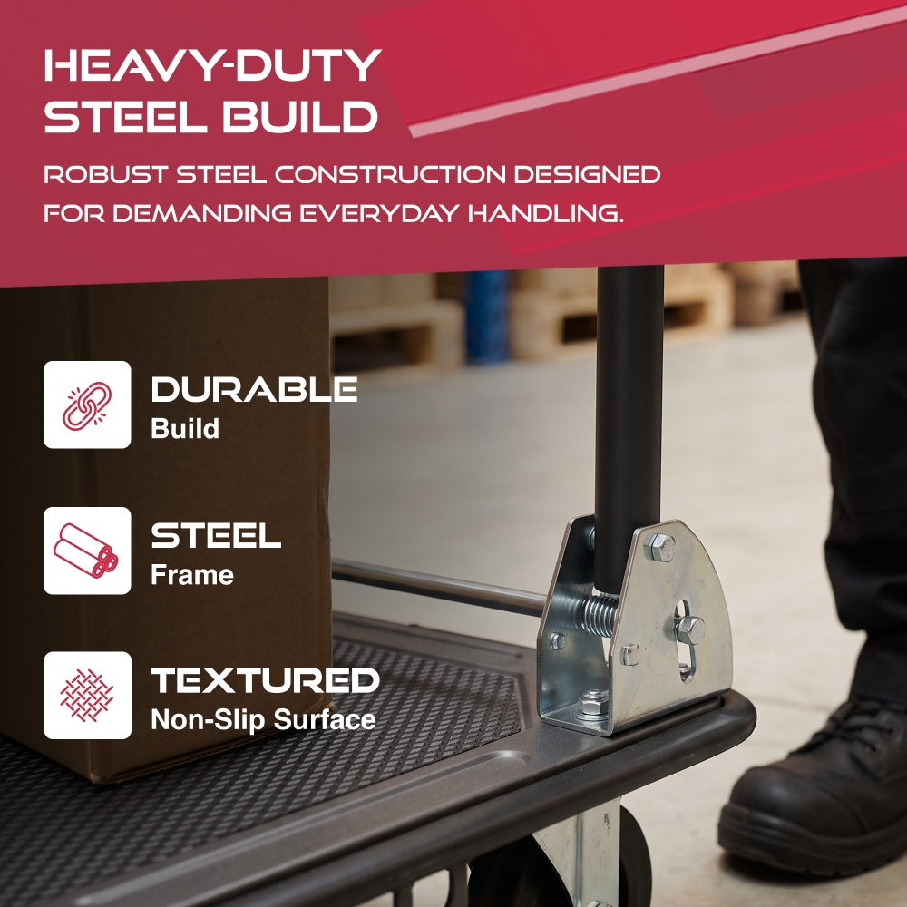 Close-up of the Haltons platform trolley steel handle bracket and textured non-slip deck beside a boxed load