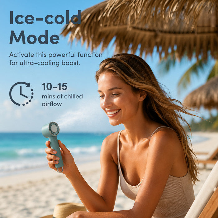 Woman using haze green handheld fan at beach – ice-cold mode, 10–15 mins chilled airflow
