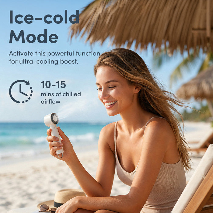 Woman using cream handheld fan at beach – ice-cold mode, 10–15 mins chilled airflow