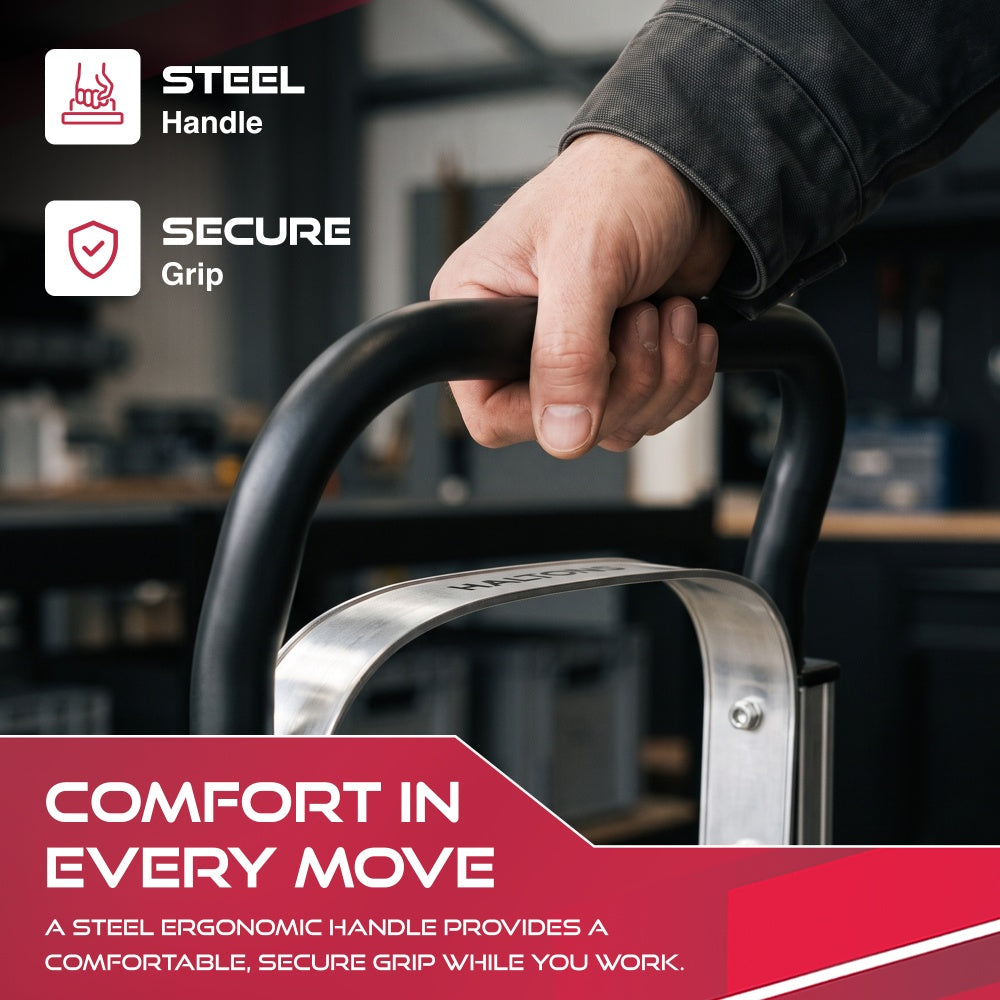 Hand gripping the black handle of the Haltons hand truck above the aluminium handle bracket