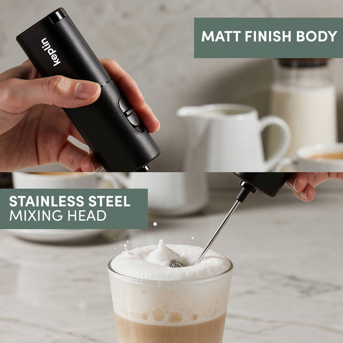 Close-up of matt black milk frother body and stainless steel whisk head frothing milk