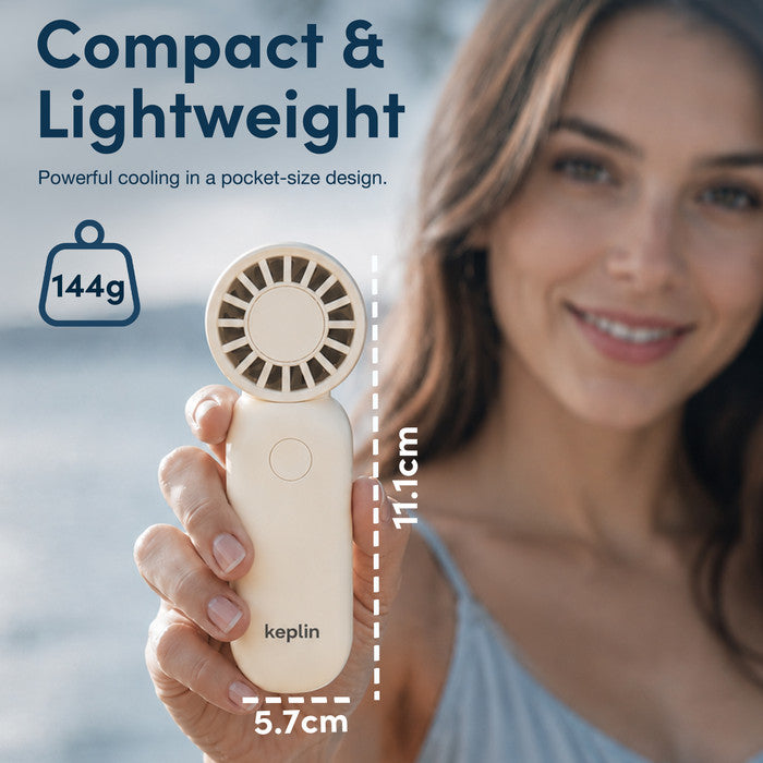 Woman holding KEPLIN compact handheld fan showing 11.1cm pocket size and 144g lightweight design