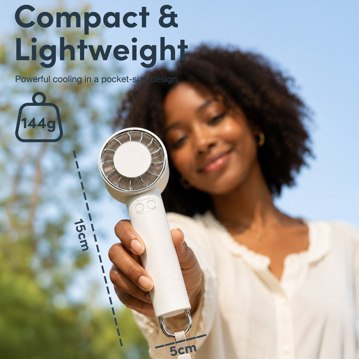 Compact lightweight cream handheld fan – 144g, 15cm tall, 5cm wide
