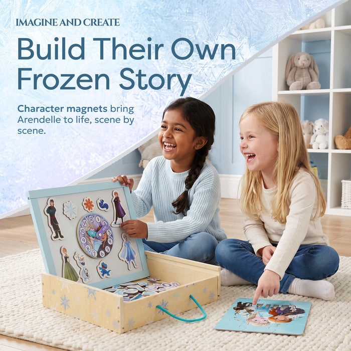 Two girls building a Frozen story with character magnets and jigsaw puzzle - magnetic toys