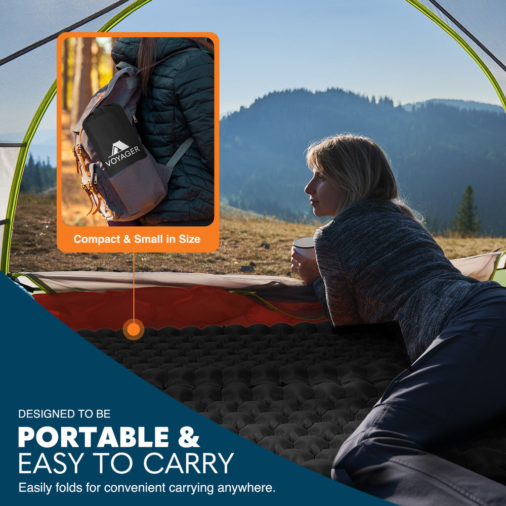 Two black camping sleeping pads connected side by side – linkable mats for family group camping
