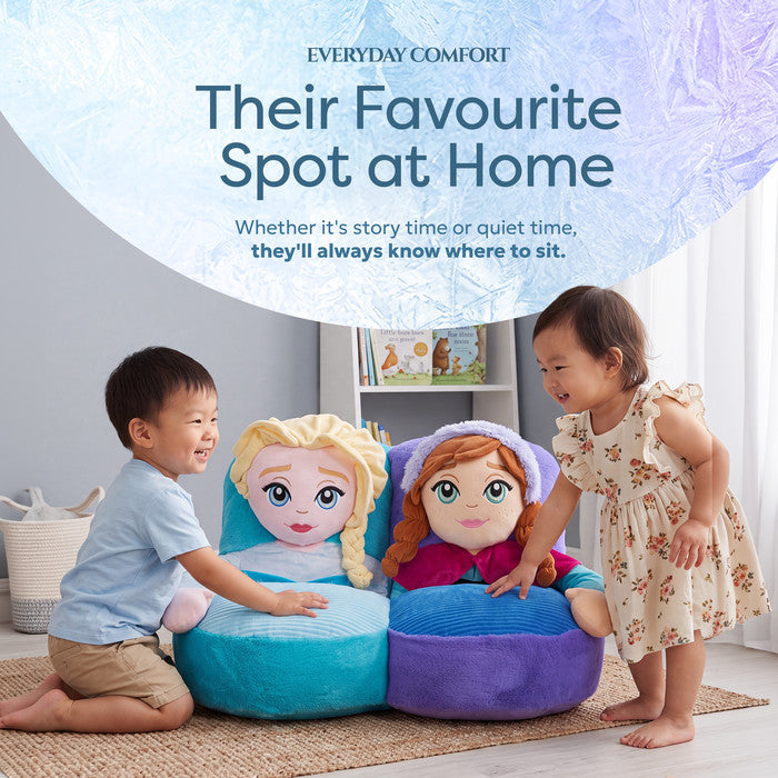 Two children playing beside Disney Frozen Elsa and Anna two-seat sofa