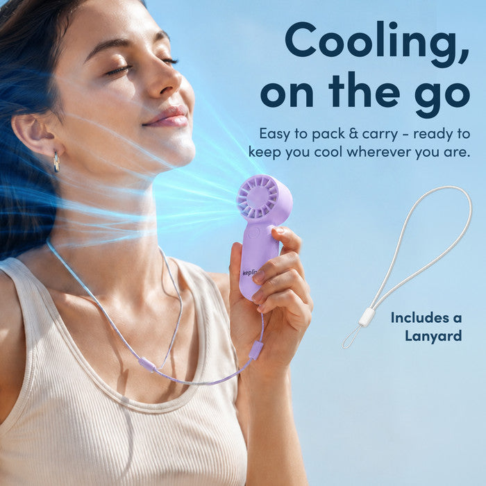 Woman cooling face with KEPLIN mini personal fan on neck lanyard strap – portable fan for summer