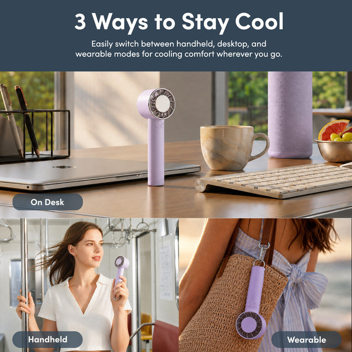 Lavender mini portable fan being placed into handbag – compact travel size