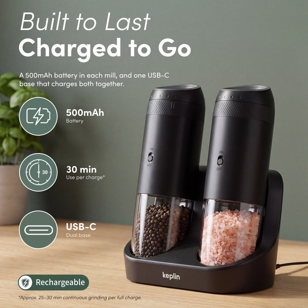 Two black gravity mills charging side by side on a USB-C dual base with battery and runtime icons